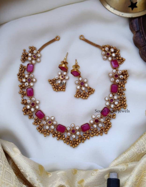 Dropdash designer choker jewelry for weddings with gold accents, pink stones, and matching earrings