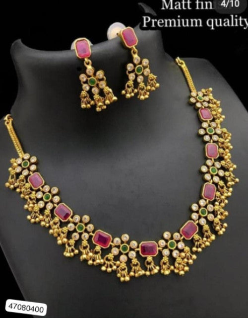 Elegant Dropdash designer choker jewelry for weddings with red stones and intricate gold detailing
