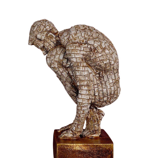 Artistic potty man figurine crafted from textured materials in a unique design