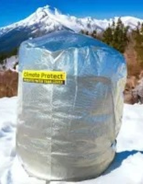 Dropdash heat proof water tank cover in silver protecting tank outdoors in snowy mountain environment