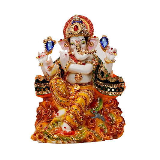 Ornate Ganesha idol for puja room with intricate details and vibrant colors