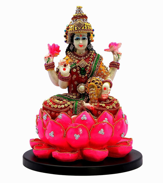 Laxmi Ji statue for home decor with intricate details on a vibrant lotus base
