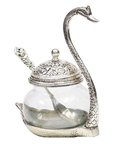 Elegant swan shape dry fruit container with a glass jar and ornate lid for stylish serving