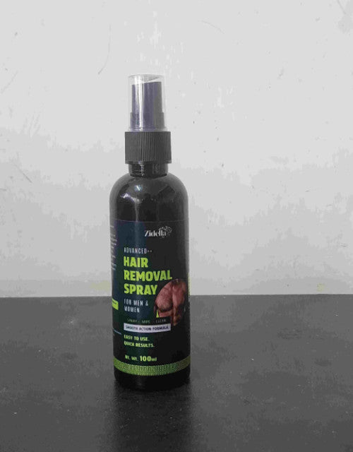 Dropdash Advanced Hair Removal Spray for men and women in a 100ml bottle on a dark surface